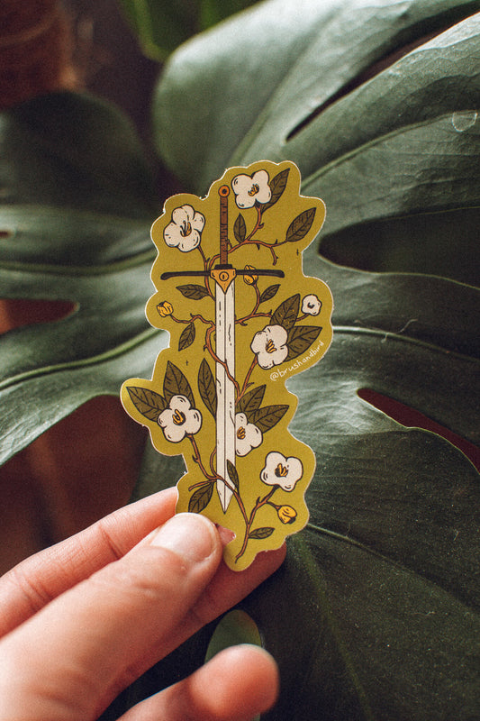 A sword entwined by flowers and thorns on a vibrant green background